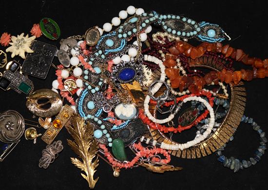 A quantity of mixed costume jewellery including amber etc.